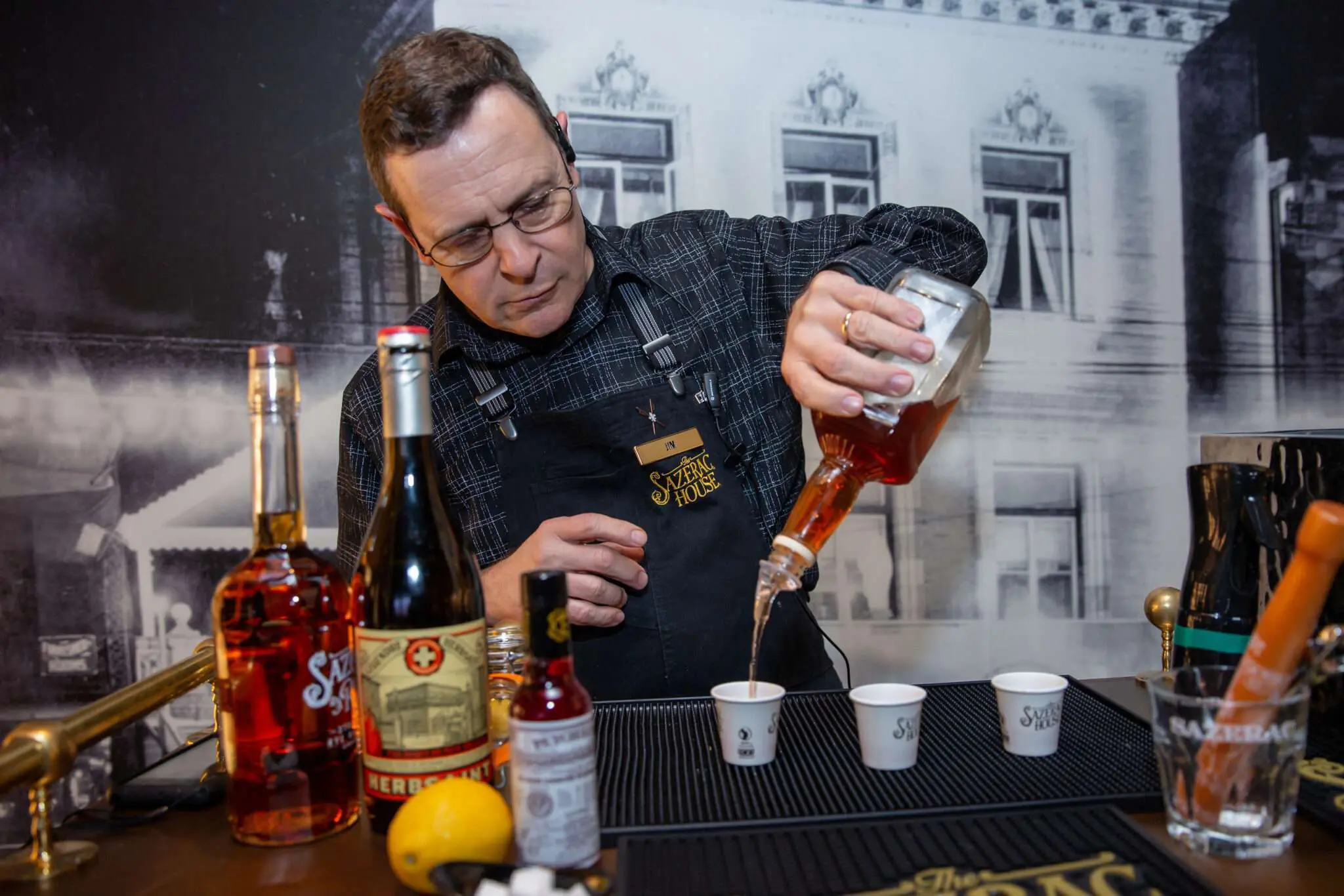 old person making drinks