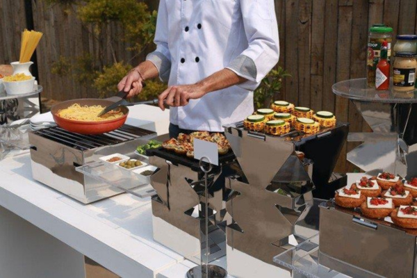 chef-attended action station at backyard catering event | messina’s catering & events